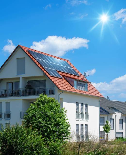home with solar energy green plants and sunny blue sky An image of a home with solar energy green plants and sunny blue sky